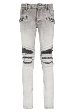 Balmain Zerrissene Slim-Jeans aus Baumwolle mit Kunstledereinsätzen