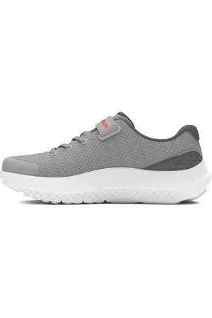 Under Armour Jungen UA BPS Surge 4 AC, leichte Laufschuhe mit Dämpfung, atmungsaktive Turnschuhe für Jungen