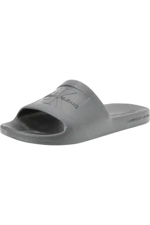 Calvin Klein Jeans Herren Badeschuhe Slide Badelatschen, (Black), 40