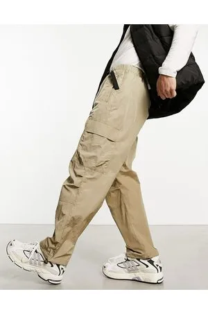 Lacoste – Arbeiterhose mit lockerer Passform in Beige