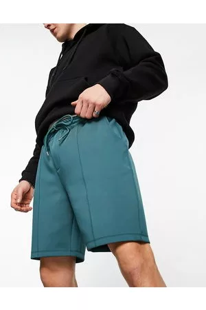 ASOS Herren Shorts - – Elegante, schmal geschnittene Shorts aus grünem Neopren-Stoff