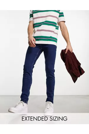 ASOS – Eng geschnittene Jeans in dunkelblauer Waschung