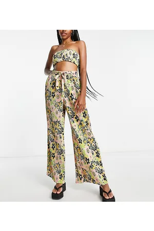 Topshop – Plissierte Strandhose mit weitem Bein und buntem Blumenmuster im Stil der 60er