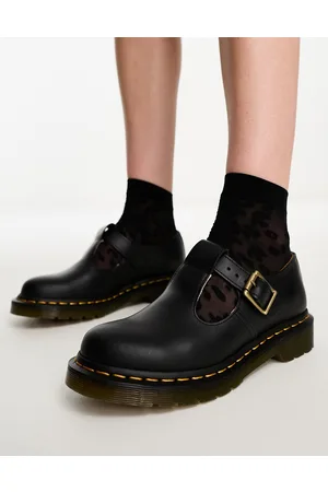 Dr. Martens Dr. Martens – Polley – Schuhe aus schwarzem Glattleder mit T-Steg-Detail