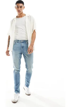 ASOS – Eng geschnittene Jeans in hellblauer Waschung
