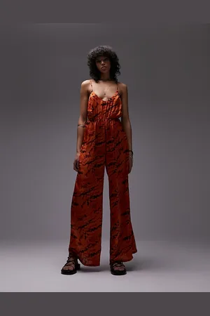 Topshop – Jumpsuit mit weitem Bein, Print und Riemchendesign