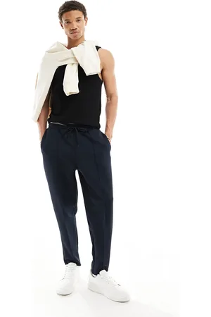 ASOS – Schmal zulaufende Jogginghose in marineblauer Neopren-Optik