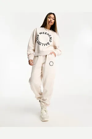 ASOS – Oversize-Jogginghose in meliertem Hellbeige mit schwarzem Logo, Kombiteil