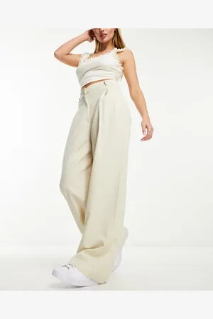 Monki – Elegante Hose in Beige mit weitem Schnitt und hohem Bund
