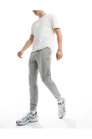 JACK & JONES – Schmal geschnittene Jogginghose in Hellgrau meliert