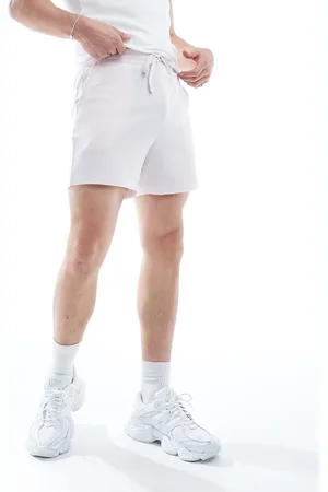 ASOS – Schmal geschnittene Shorts in Hellrosa mit Waffelstruktur