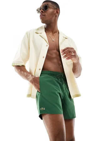 Lacoste – Dunkelgrüne Badeshorts mit Logo