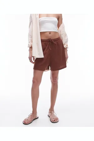 Topshop – Lässige Shorts in Rostrot mit Knitterstruktur und Tunnelzug