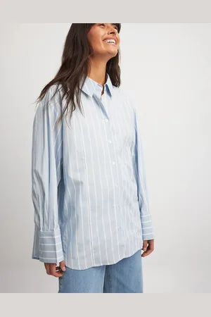 NA-KD X Laura Jade Stone – Oversize-Hemdbluse in und Weiß gestreift mit breiten Manschetten