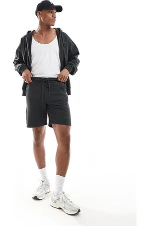 The Couture Club – Shorts aus Jersey in Anthrazit mit unversäuberten Nähten, Kombiteil
