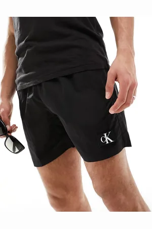 Calvin Klein – Mittellange Badeshorts aus Nylon in mit Tunnelzug und Monogramm-Logo