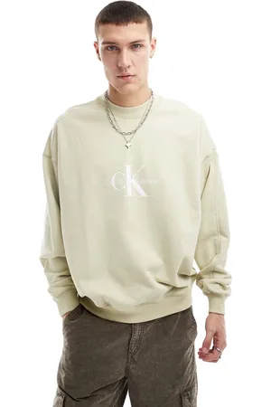 Calvin Klein – Archival Monologo – Sweatshirt in Beige mit Rundhalsausschnitt