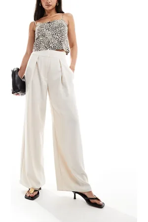 River Island – Bügelfaltenhose in Creme mit weitem Bein
