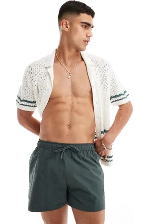 River Island – Badehose aus Seersucker in Khaki
