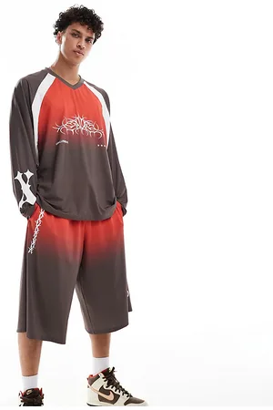 COLLUSION – Longline-Trainingsshorts in und Rot, Kombiteil