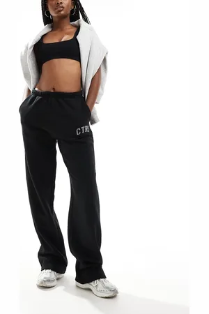 The Couture Club – Weit geschnittene Jogginghose in mit „CTRE“-College-Print