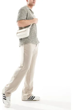 The Couture Club – Hose in Beige mit Saumschlitz
