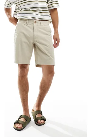 Superdry – Elastische Chino-Shorts in Pelikan-Beige
