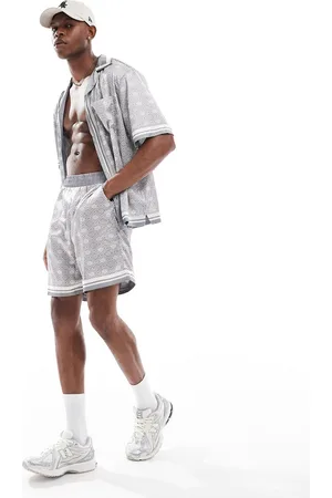 The Couture Club – Shorts in mit Emblem-Muster, Kombiteil