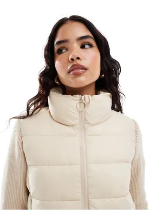 Stradivarius – Wattierte Jacke in Beige mit Ärmeln aus Strick