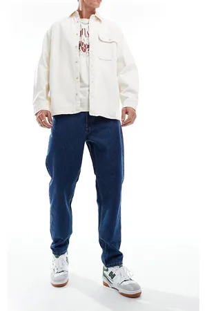 Only & Sons – Tye – Schmal zulaufende Jeans in dunkelblauer Waschung mit lockerem Schnitt