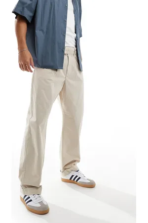 SELECTED – Locker geschnittene Hose in Beige mit Umschlag