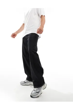 Weekday – Sphere – Locker geschnittene Jeans in schwarzer Acid-Waschung mit niedrigem Bund