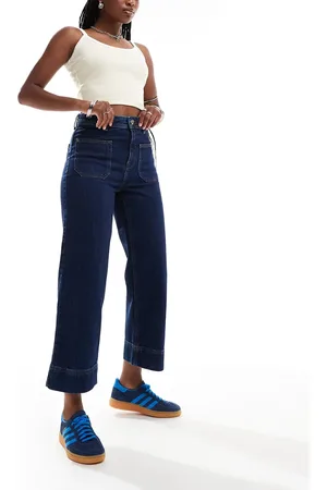 River Island – Verkürzte Jeans in mittelblauer Waschung mit weitem Schnitt