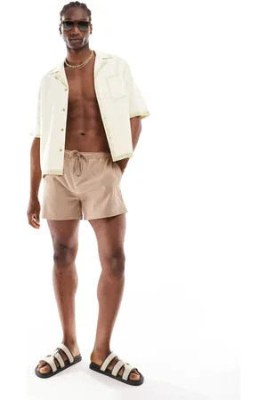 River Island – Badehose aus Seersucker in Steinbeige