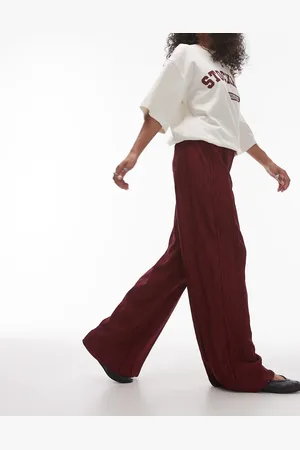 Topshop – Weit geschnittene Plissee-Hose in Burgunderrot mit Knitterstruktur