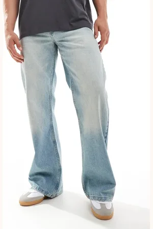 ASOS – Weite Schlagjeans in blauer Waschung