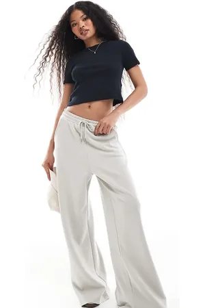 Stradivarius Petite – Weiche Jogginghose in Hellgrau mit weitem Bein