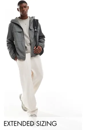 ASOS – Gummierte Regenjacke in Anthrazit mit Brusttaschen