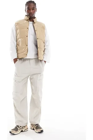 Lee – Wendbare Pufferweste im Westernstil in Beige/Hellbraun