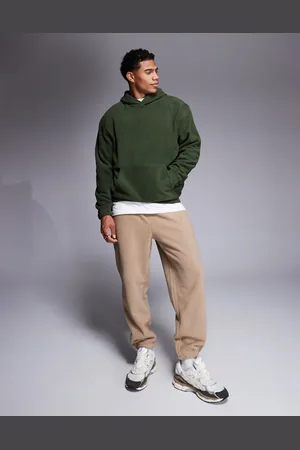 ASOS – Schmal zulaufende Jogginghose aus braunem Fleece