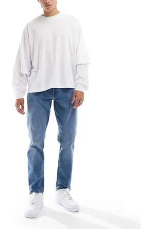 JJ – Adam – Schmal zulaufende Jeans in mittelblauer Waschung