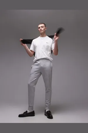 Lacoste – Schmale Jogginghose in mit Logo