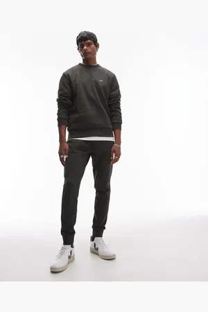 Lacoste – Schmale Jogginghose in Khaki mit Logo