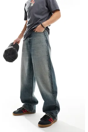 COLLUSION – X001 – Sehr weite Jeans in blauer Stone-Waschung
