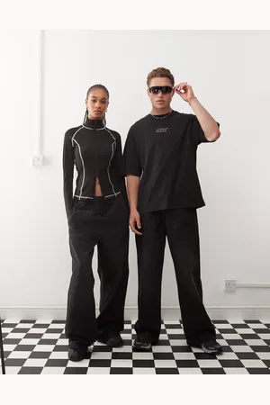 COLLUSION Unisex – Jeans im Trainingshosen-Design in verwaschenem