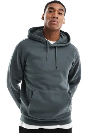 Hollister – Locker geschnittener Kapuzenpullover in Khaki mit Markenlogo