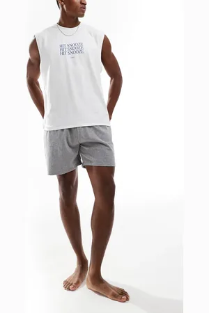 ASOS – Pyjama in mit „Hit Snooze“-Kunstprint