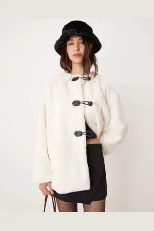 VILA – Kragenlose Duffle-Jacke aus Kunstpelz in Creme