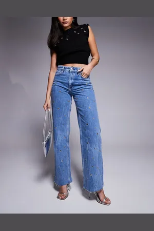 River Island – Locker sitzende Jeans in mittelblauer Waschung mit geradem Schnitt und Ösendetail