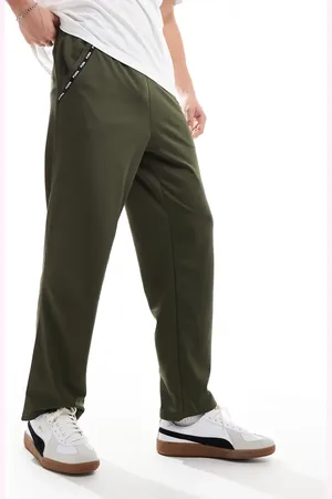 PUMA – PWRFleece Lite – Jogginghose in Olivgrün mit Zierstreifen